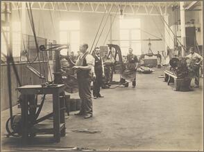 [Workers in a Brooklyn Rapid Transit machine shop.]