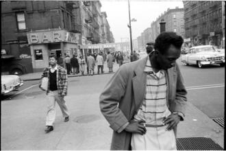 Changing New York [8th Avenue between 116th and 117th Streets.]