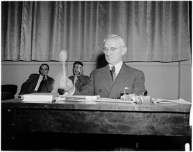Dale Carnegie [Dale Carnegie teaching a public speaking class.]