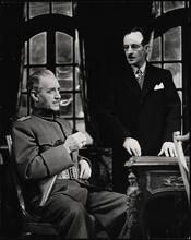 [Otto Kruger as Colonel Lanser and E. J. Ballantine as George Corell in "The Moon is Down".]