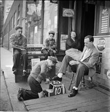 Shoe Shine Boy [Mickey shining shoes.]