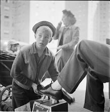 Shoe Shine Boy [Mickey shining shoes.]