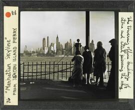 Manhattan skyline from Staten Island ferry. The towering office buildings of stone and steel piercing the sky.