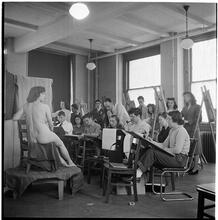Columbia University [Students drawing a nude in an art class.]