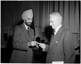 Dale Carnegie [Dale Carnegie speaking with S. S. Jaaj, a student.]