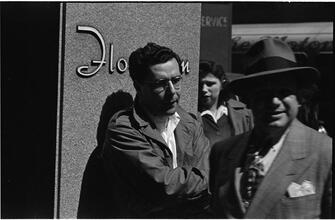 People Waiting [Candid shots of a man waiting in front of Florsheim Shoes.]