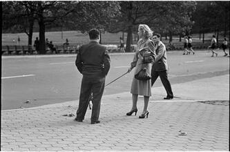 Men Are Such Wolves [Man talking to a woman in the park.]