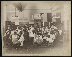 Interior, Group Children's Sewing Class at N.Y. Public Library, 224 East 125 St.