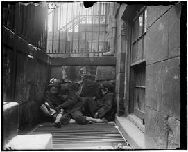 Street Arabs in sleeping quarters.