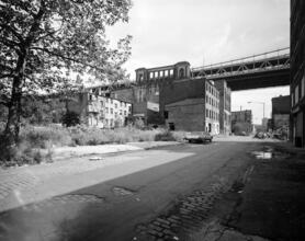 [Manhattan Bridge overpass and surrounding neighborhood.]