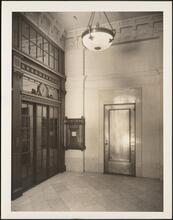 [Interior, elevator lobby.]