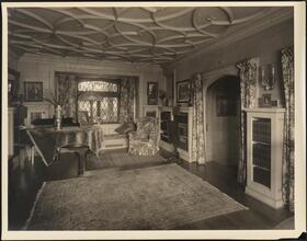 [Residence. Interior, parlor.]