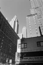 [Looking north toward the towers of the Waldorf-Astoria and the General Electric Building from 525 Lexington Avenue.]