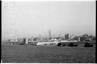 [Manhattan waterfront and skyline seen from the Hudson River.]