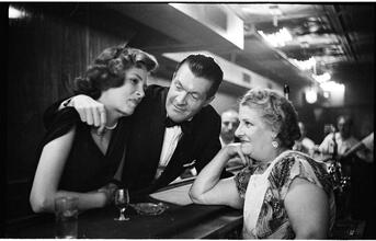 Peter Arno [Arno and a woman at a bar.]