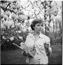 Betsy Von Furstenberg [In front of a magnolia tree.]