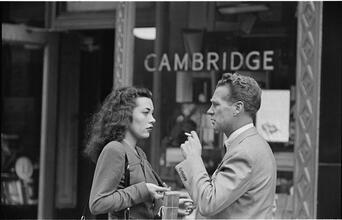 Street Conversations [Man and woman talking on the street.]