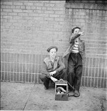 Shoe Shine Boy [Mickey and a friend by his shoe shine stand.]