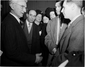 Dale Carnegie [Dale Carnegie speaking to a group of people.]