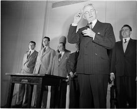 Dale Carnegie [Dale Carnegie teaching a public speaking class.]