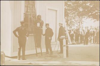 [Fire fighters.]