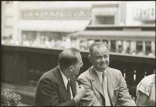 Bronx Street Scene [Two men talking.]