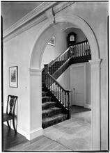W. E. Ditmars [residence]. Stair case thru arch.