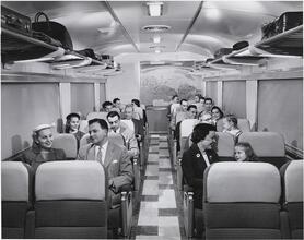 [Passengers in a railroad car.]