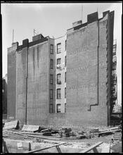 322-24 East 71st Street. Additional view from N.E. looking S.W. of wall to 320 East 71st Street, 11:34 A.M.
