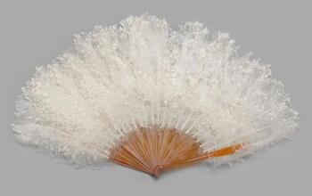 Folding feathered fan of white ostrich chick feathers