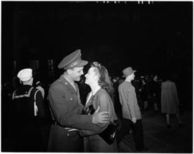 Penn Station [Soldier reuniting with a woman.]