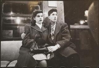 Life and Love on the New York City Subway [Couple on a subway.]