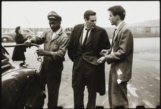 Montgomery Clift - Glamour Boy in Baggy Pants [Montgomery Clift and another man talking as a gas station attendant pumps gas.]