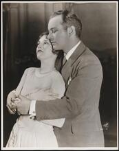 [Madge Kennedy as Miss Diana Wynne and Sidney Blackmer as Mr. Gregory Farnham in "Love in a Mist".]