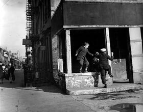 Untitled [Boys playing in abandoned building]
