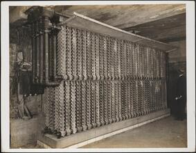 [Interior, possibly a basement, with unidentified equipment.]