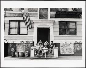 Fourth of July, hanging out on the stoop of their apartment house