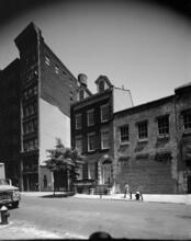 [North side of East 4th Street between Bowery and Lafayette Street.]