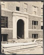 [Jackson Heights Apartments. Entrance. Construction.]