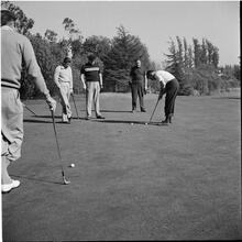 Arthur Godfrey [Godfrey playing golf.]