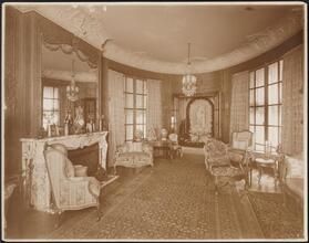 [Residence. Interior, parlor.]