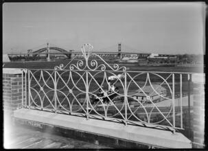 [Triborough and Hell Gate Bridges from a balcony.]