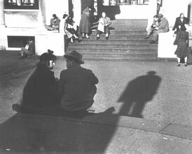 Untitled [Couple sitting at base of statue, Union Square]