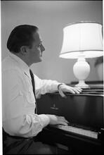Christopher Lynch [Christopher Lynch, Irish tenor, at a piano.]
