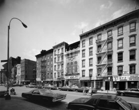 [Storefronts at the intersection of Division and Canal Streets.]