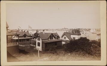 [Unidentified waterfront town, with sailing vessels]