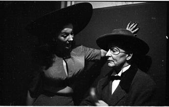 Show Girl [Rosemary talking to a man in costume.]