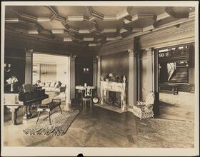 [Residence. Interior, parlor.]