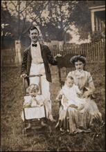 [Al Smith at the age of 27 with his wife, Catherine Ann Dunn, and their children Alfred, Jr. and Emily.]