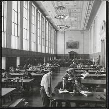 Columbia University [Students studying in Butler Library.]